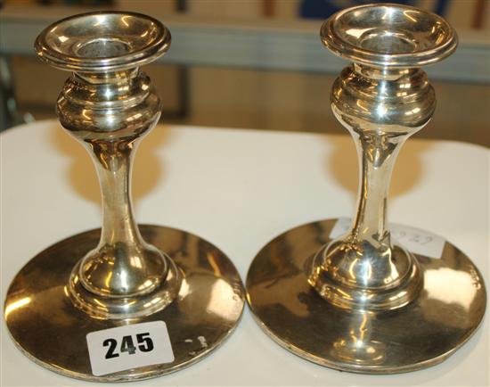 Pair of silver dwarf candlesticks